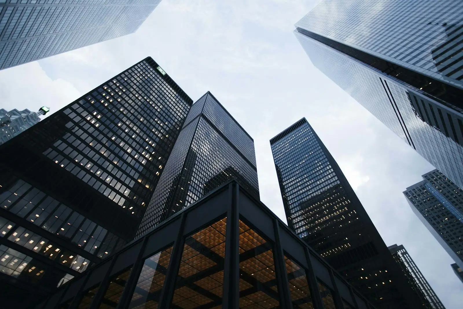 Contemporary glass architecture viewed towards the sky